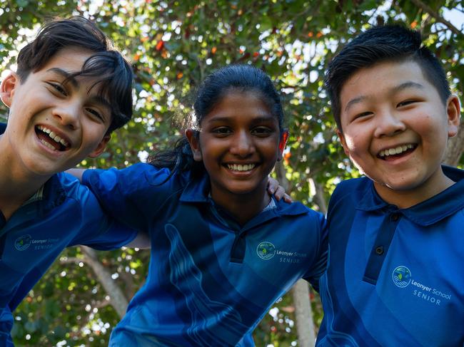 Leanyer School students Liam Chaves-Hopwood, Saanvi Maddirala and Marcus Lim are excited to celebrate the 40th birthday and anniversary of their school.Picture: Pema Tamang Pakhrin