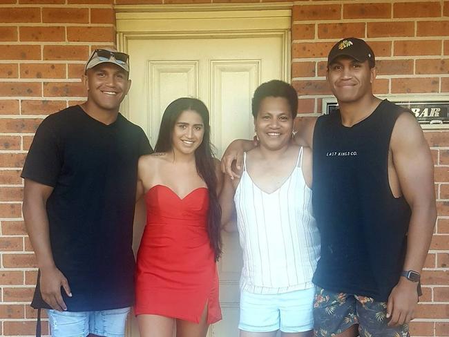 Newcastle Knights twins Daniel and Jacob Saifiti with their mum Beverly and sister.