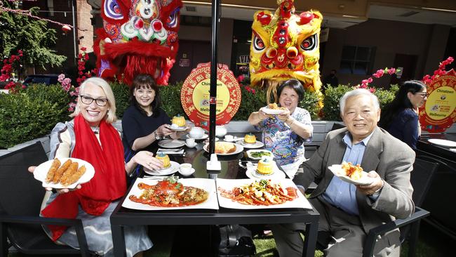 Melbourne Lord Mayor Sally Capp enjoys some Chinese food with Jane Ju from Chine on Paramount, Chinatown Precinct Association vice president Eng Lim and President Danny Doon outside in Little Bourke St. Picture: David Caird