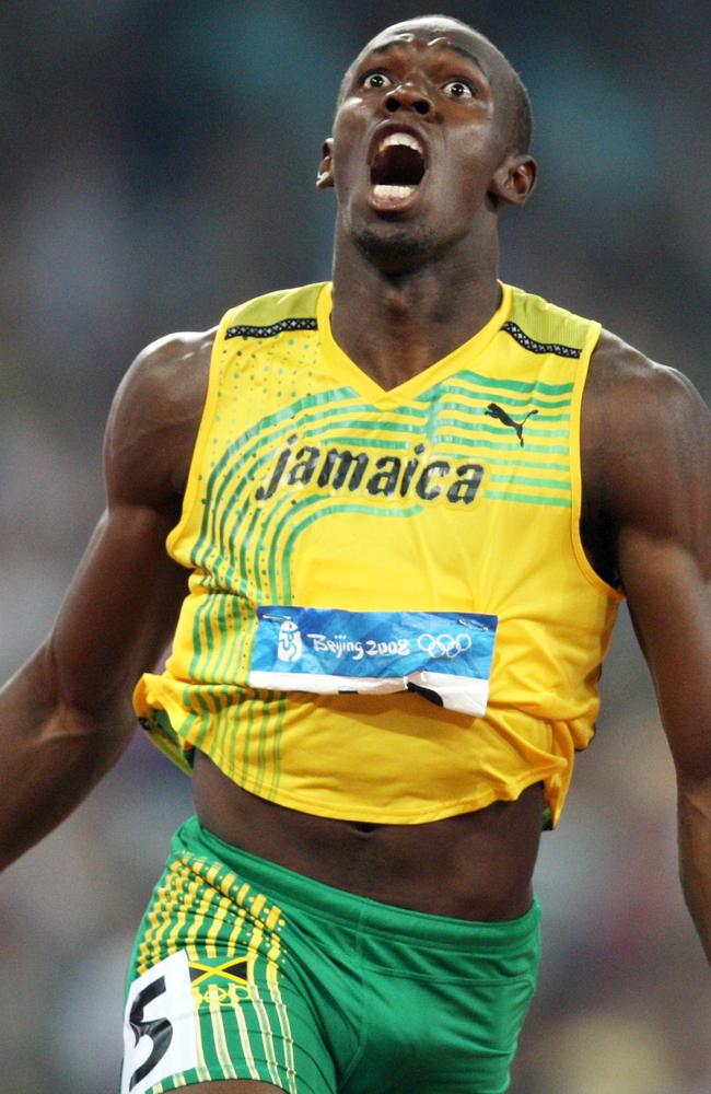 Jamaican athlete Usain Bolt celebrates winning the men's 200m final at the 'Bird's Nest' National Stadium during the 2008 Beijing Olympic Games, 20/08/2008. Bolt became the first man in 24 years to claim the Olympic sprint double when he won the 200m in a new world record time of 19.30 seconds.
