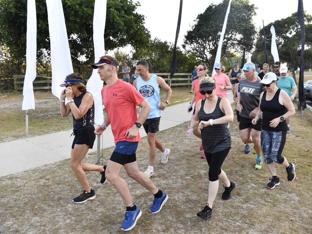 Competitors take off from the Whiting Beach start of the Yamba Triathlon Fun Run on Saturday morning.