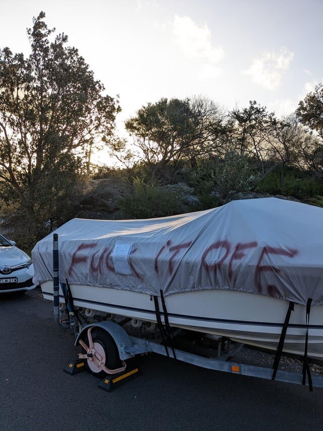 A dispute in Freshwater made headlines in November after a local vandal spray-painted ‘F**k it off’ over a parked boat. Picture: Reddit