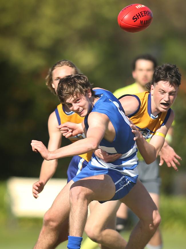 Malachy Carruthers gets a kick away during the round five match against Sacred Heart at home. Picture: Dean Martin