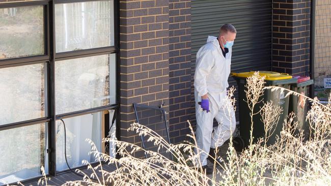 Police at the scene of the tragedy at Redwood Park. Picture: Brett Hartwig