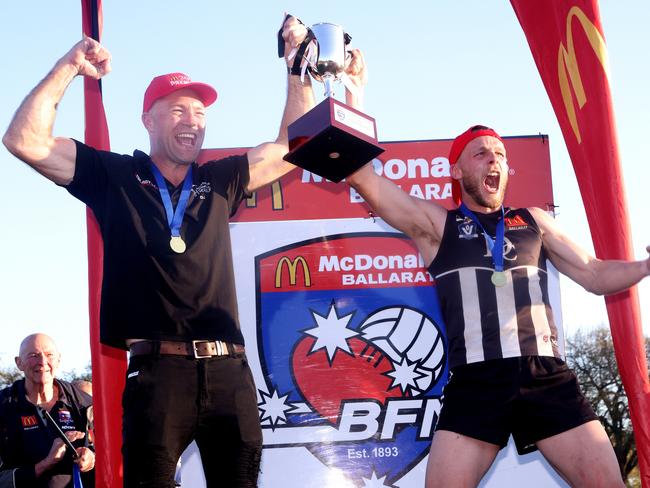 Ballarat FNL grand final: Darley v North Ballarat: Coach Dan Jordan and Captain Brett Bewley of Darley celebrate with the cup at City Oval on September 23, 2023 in Lake Wendouree, Australia.Picture: Hamish Blair