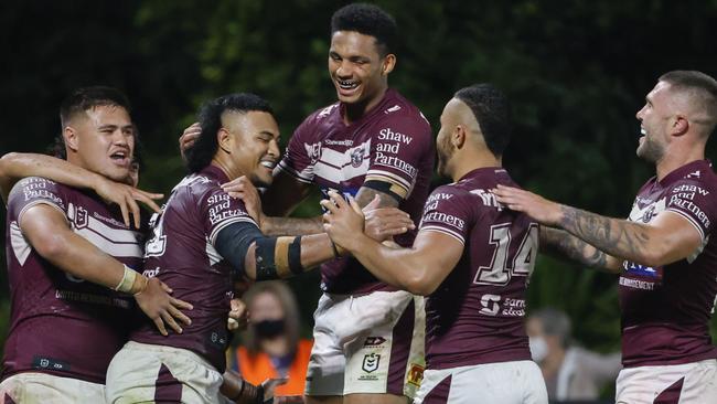 SUNSHINE COAST, AUSTRALIA - AUGUST 14: Haumole Olakau'atu of the Sea Eagles celebrates with his teammates after scoring a try during the round 22 NRL match between the Manly Sea Eagles and the Parramatta Eels at Sunshine Coast Stadium, on August 14, 2021, in Sunshine Coast, Australia. (Photo by Glenn Hunt/Getty Images)