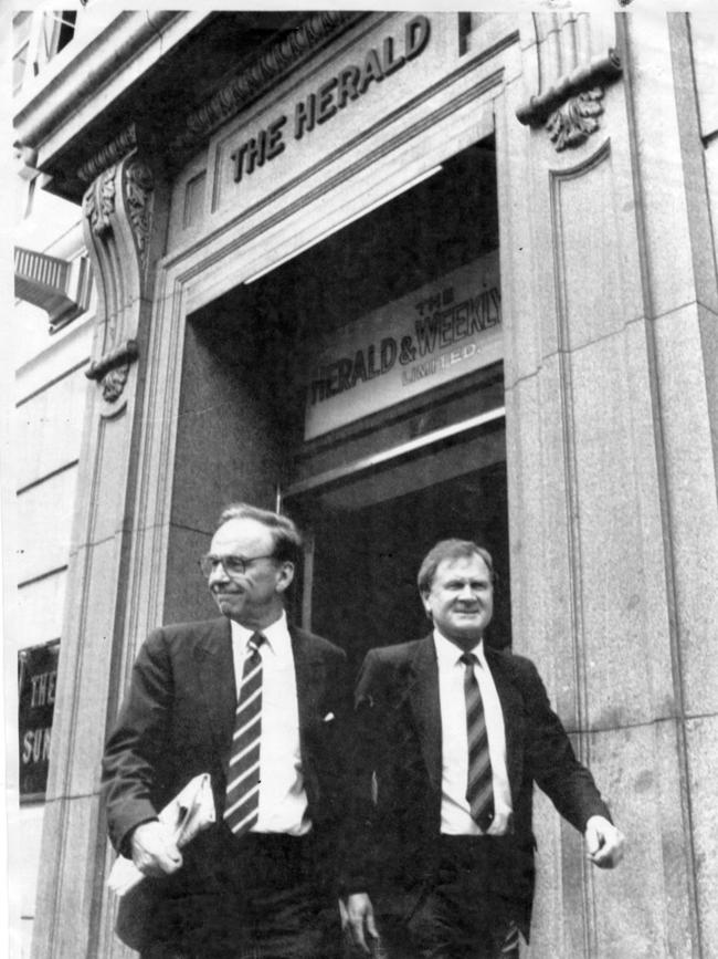 Rupert Murdoch and Ken Cowley leave the Herald &amp; Weekly Times building while negotiating the 1987 takeover.