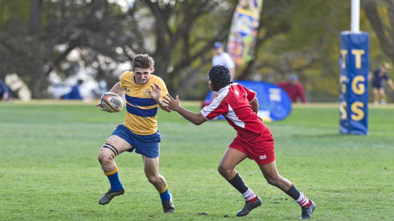 GOOD SPEED: Toowoomba Grammar School 2nd XV player Mitchell Bourke breaks through the Ipswich Grammar line. Picture: Kevin Farmer