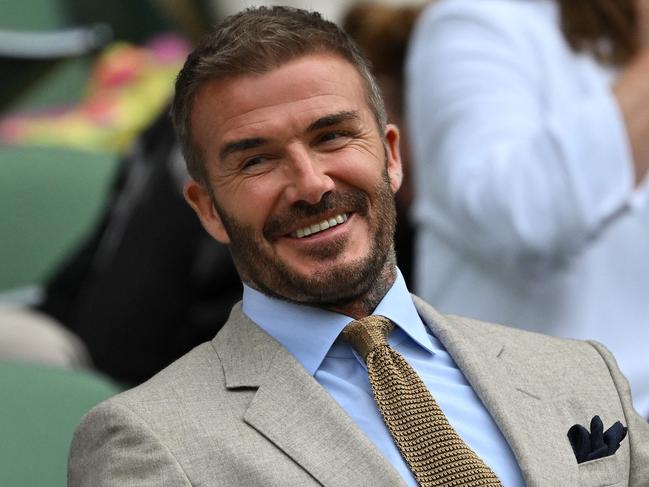 Former England footballer David Beckham sits on Centre Court to watch the Men's singles tennis matches on the first day of the 2024 Wimbledon Championships at The All England Lawn Tennis and Croquet Club in Wimbledon, southwest London, on July 1, 2024. (Photo by Glyn KIRK / AFP) / RESTRICTED TO EDITORIAL USE