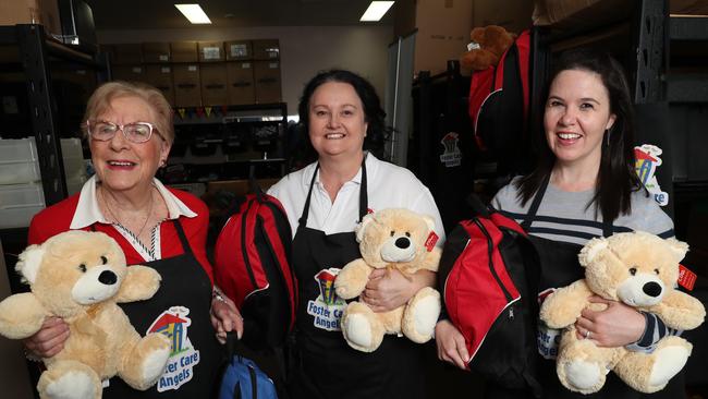 Joy Jones, Rebecca Ristic and Kelly Doyle pose for a photo at Foster Care Angels in Castle Hill for DoSomething Day 2018. Pic: AAP Image/David Swift