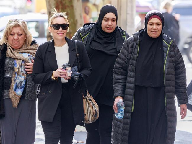 Family and friends of the accused men arrive at the Supreme Court. Picture: David Geraghty