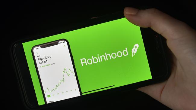 The Robinhood app is one of the tools used by day traders in the conflict against the Wall Street elite. Picture: AFP