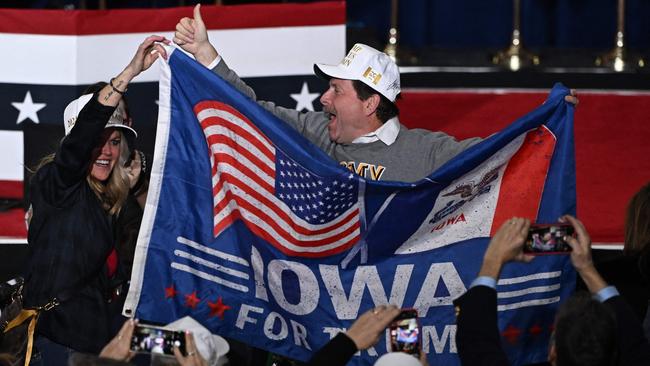 Supporters of former US President and Republican presidential hopeful Donald Trump celebrate at a watch party during the 2024 Iowa Republican presidential caucuses. Picture: Jim WATSON / AFP