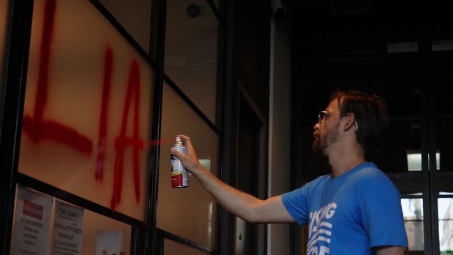 Images posted on activist group Rising Tides’ social media show Environment Minister Tanya Plibersek’s office being vandalised. Picture: Supplied