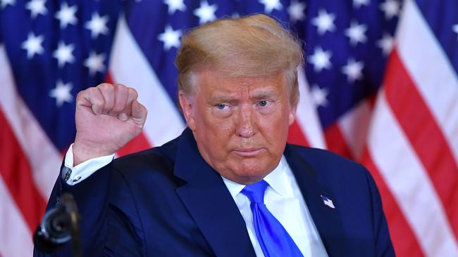 Trump pumps his fist after speaking during election night in the East Room of the White House in Washington in 2020. Picture: AFP