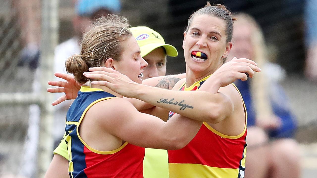 Chelsea Randall and Chloe Scheer celebrate a goal against Collingwood. Picture: AFL Photos/Getty Images