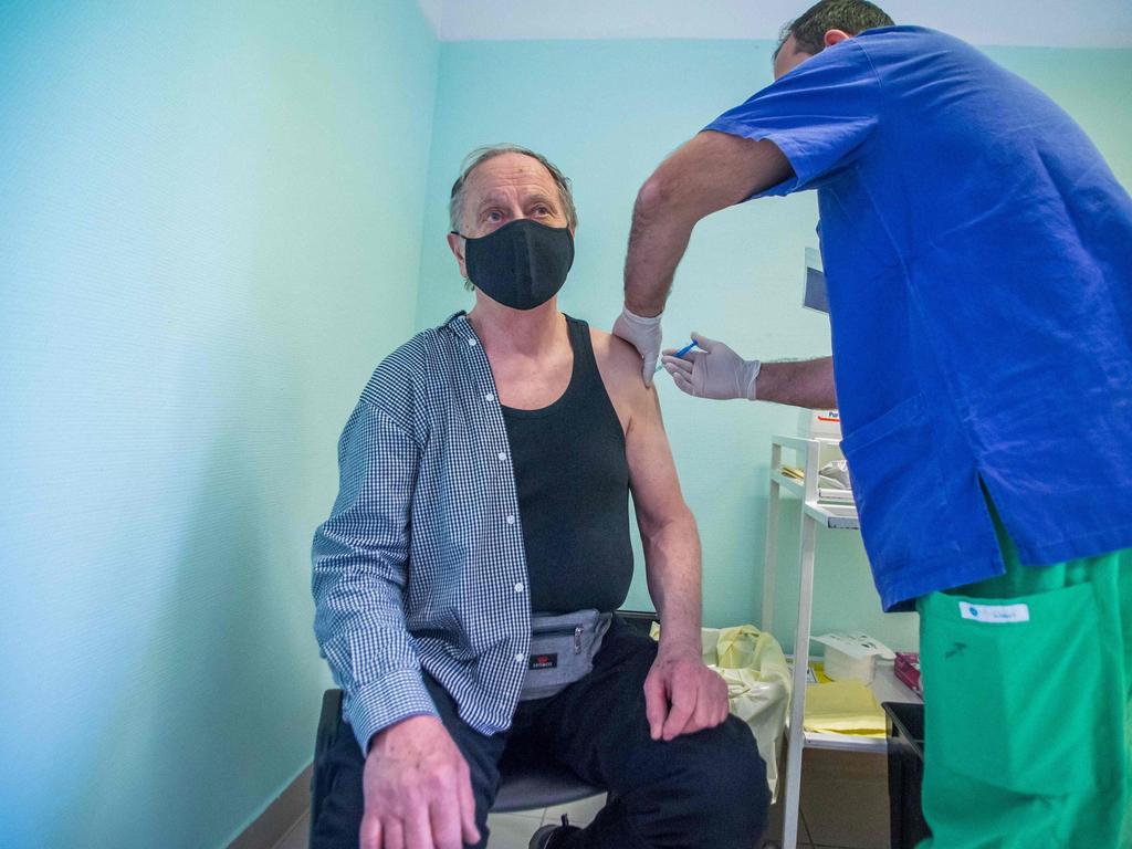 A man receives the first dose of Russia's Sputnik V vaccine. Picture: AFP