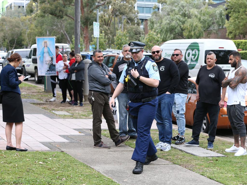 Protestors have begun to gather outside Kiis FM headquarters in North Ryde to protest against comments Kyle Sandilands made about Christians and the Virgin Mary. Picture: David Swift.