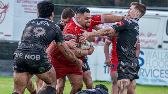 East Campbelltown’s Jonathan Langsiu proving tough to handle. Picture: Thomas Lisson