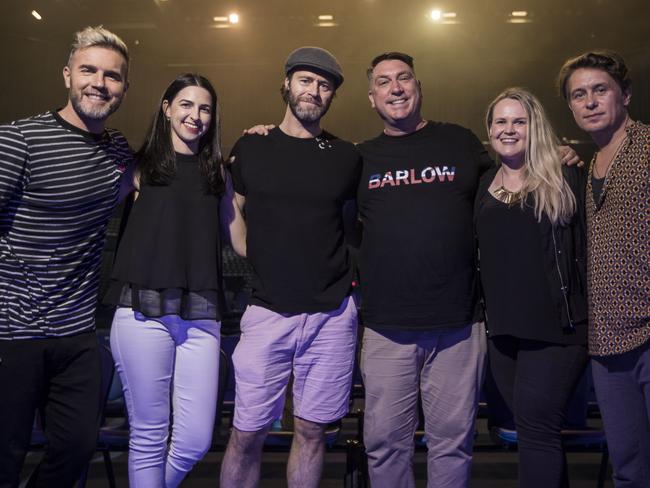 Take That with fans Jasmine Crowsley, Tony Hamlyn and Mel Reed. Photo by Michael Wilson, The West Australian.