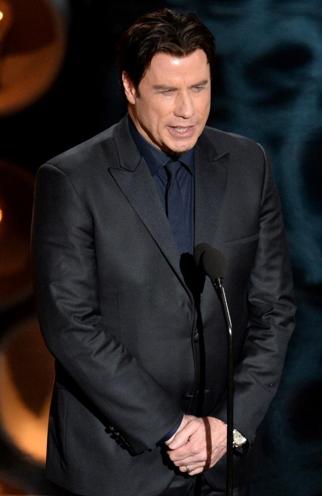 John Travolta Mispronouncing Idina Menzel’s Name! John Travolta introduces Idina Menzel who sang “Let It Go” from Frozen by calling her “Adele Dazeem” onstage during the Oscars at the Dolby Theatre on March 2, 2014 in Hollywood, California. (Photo by Kevin Winter/Getty Images)