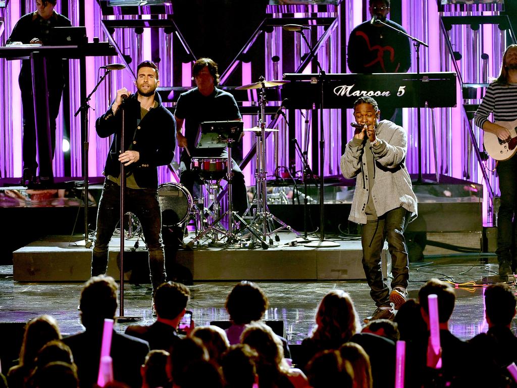 Singer Adam Levine of Maroon 5 and rapper Kendrick Lamar perform onstage during the 2016 American Music Awards at Microsoft Theater on November 20, 2016 in Los Angeles, California. Picture: Getty