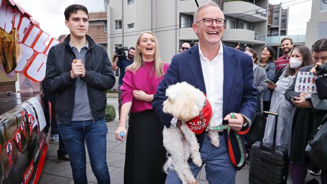 Federal Labor leader Anthony Albanese arrives at Marrickville with partner Jodie Haydon, son Nathan and dog Toto to cast his vote on Election Day. Picture: Sam Ruttyn