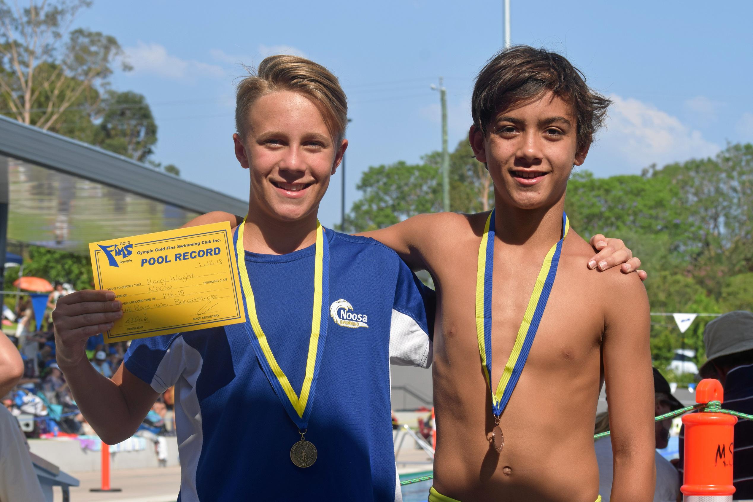 Harry Wright of Noosa wins gold and a pool record in the 100m breaststroke and James Hangad of Gympie places third. The Gympie Gold Fins swimming carnival, Saturday December 1. Picture: Josh Preston