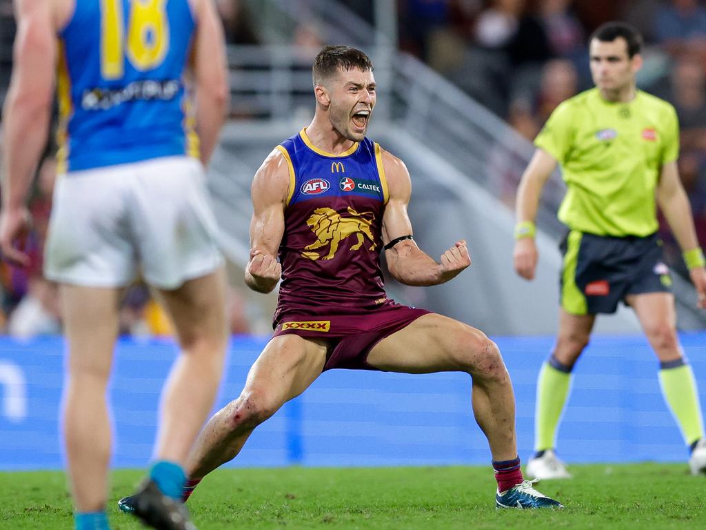 BRISBANE, AUSTRALIA - MAY 05: Josh Dunkley of the Lions celebrates a goal during the 2024 AFL Round 08 match between the Brisbane Lions and the Gold Coast SUNS at The Gabba on May 05, 2024 in Brisbane, Australia. (Photo by Russell Freeman/AFL Photos via Getty Images)