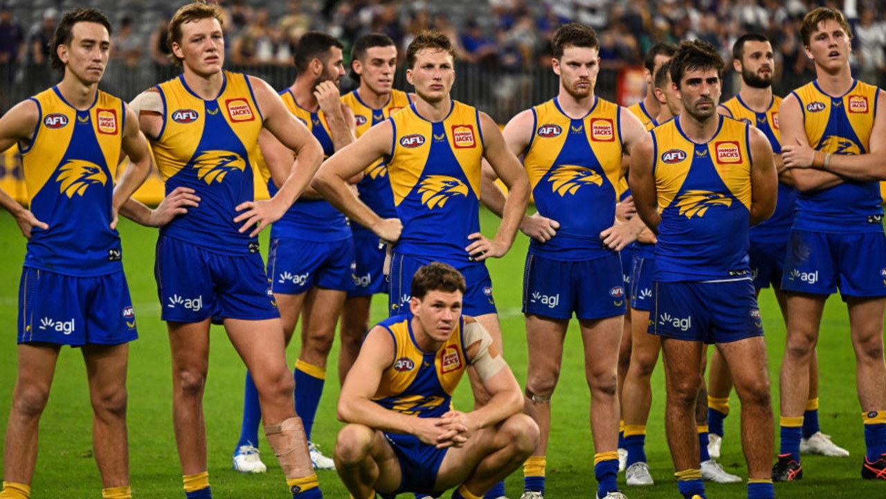 PERTH, AUSTRALIA - APRIL 03: The Eagles look on after the loss during the 2022 AFL Round 03 match between the West Coast Eagles and the Fremantle Dockers at Optus Stadium on April 03, 2022 In Perth, Australia. (Photo by Daniel Carson/AFL Photos via Getty Images)