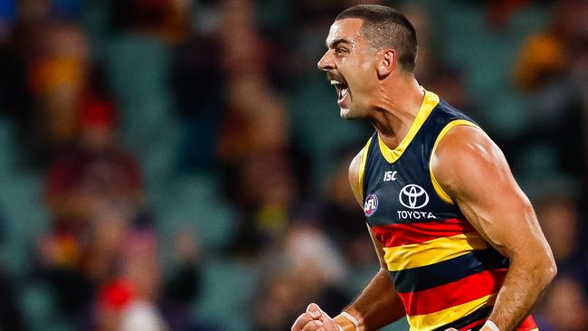 Taylor Walker celebrates a goal against St Kilda Saints at Adelaide Oval on Monday night.