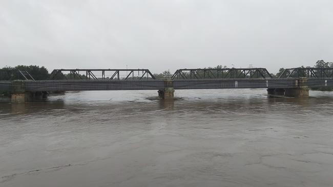 The Nepean River is now about 2 metres from the bottom of Victora Bridge. Picture: Kelly Robinson