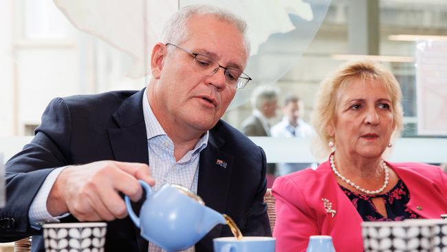 Scott Morrison with Michelle Landry visiting seniors at Hummingbird cafe in Rockhampton on Wednesday. Picture: Jason Edwards