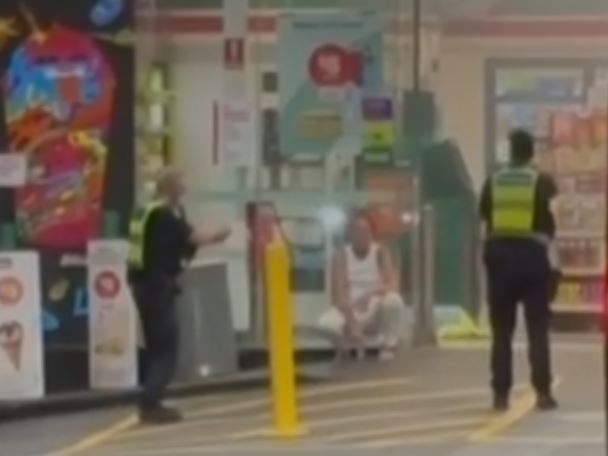 Police order the woman to ‘get on the ground’ before hitting her. Picture: 7News