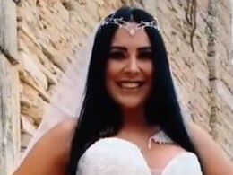 Bride exposes bum in racy wedding dress