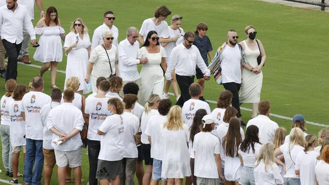 The Stewart Family are surrounded by loved ones at the funeral service for Balin Stewart at Sunshine Coast Stadium. Picture: Lachie Millard