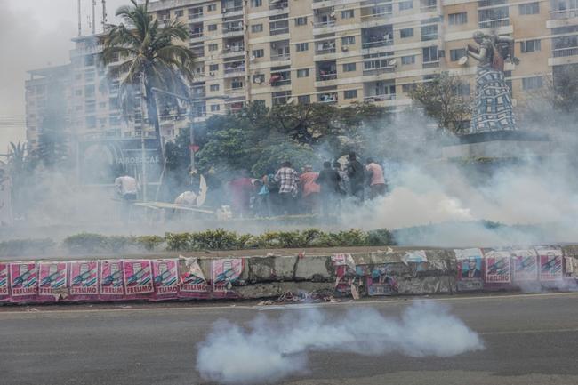 Police fired tear gas to disperse opposition protesters