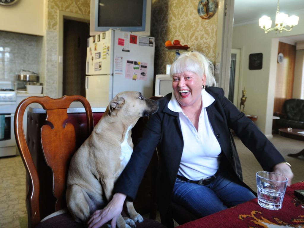 Brothel owner madam Stormy Summers at her Blair Athol home with her dog Doof.