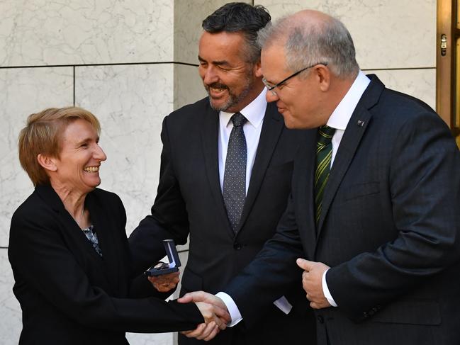 Prime Minister Scott Morrison (right) and Veterans Affairs Minister Darren Chester with veteran Kelly Wright. Picture: Mick Tsikas