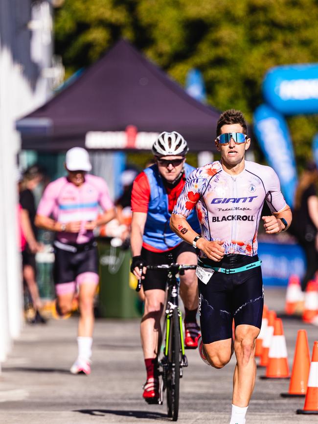 Matt Burton in the Ironman 70.3 Tasmania in Hobart Picture: Linda Higginson