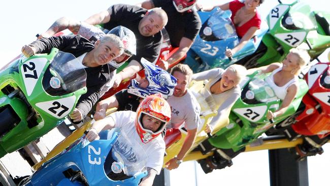 Crusty Demons at Dreamworld on Mick Doohan Motocoaster, Mick Doohan and Crusty Demon rider Steve Mini on front of ride