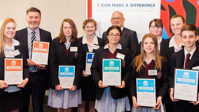 Marian Catholic College Kenthurst's students were honoured at the Premier's Volunteer Recognition Program. From left: Lauren Brown, Stephen Kinchington (Marian Catholic College teacher), Chloe Boucher, Caitlin McDonald, Trevor Khan of the NSW Upper House, Ella Coddington, Allanah Kenchington. Front row: Donya Nematian, Samantha Dinnerville, Jake D'Anastasi. Absent: Jacob Boulus and Caitlin Fenech