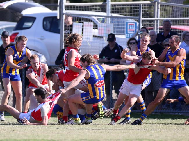 Somerville and Red Hill players battle it out on Saturday. Picture: Brendan Francis