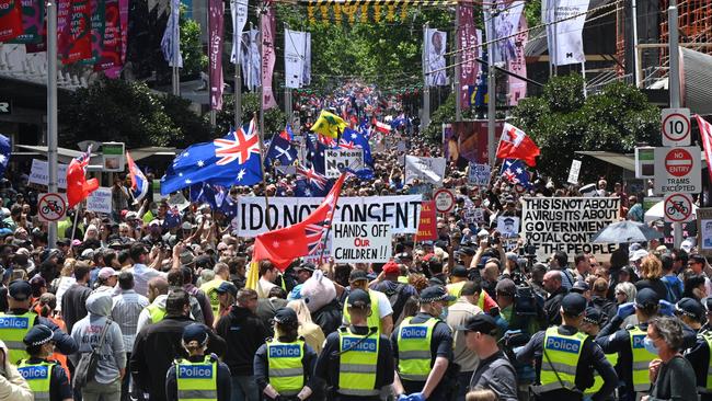 Police monitor the rally. Picture: Tony Gough