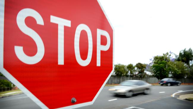 A Brisbane man has issued a warning to other motorists after he was fined for stopping too far from a stop sign.