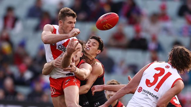 Luke Parker clears by hand during the first quarter. Picture: Michael Klein