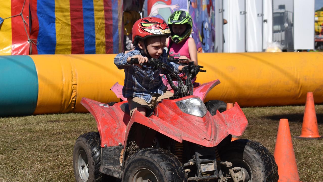 Kids loved getting in on the quad bike action at the Bowen Show. Picture: Kirra Grimes