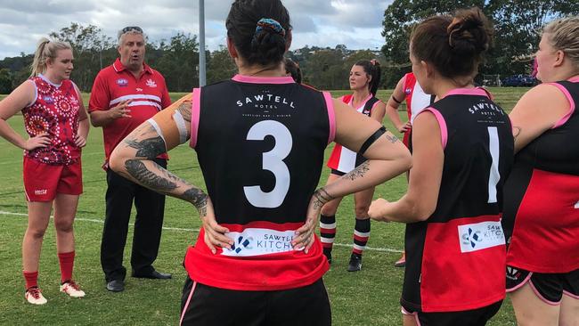 COACH FEEDBACK: Lismore Swans women's coach Ken McPherson addressed the Sawtell Saints after the match and told him he felt they played an excellent game and that they could hold their heads high despite the scoreboard. Photo: Alison Paterson