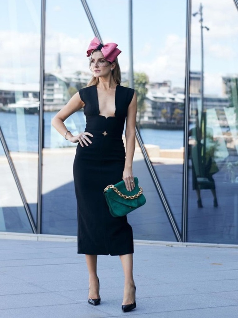 Racing royalty Kate Waterhouse opted for a fittned black dress that featured a plunging neckline. Picture: Instagram/katewaterhouse7