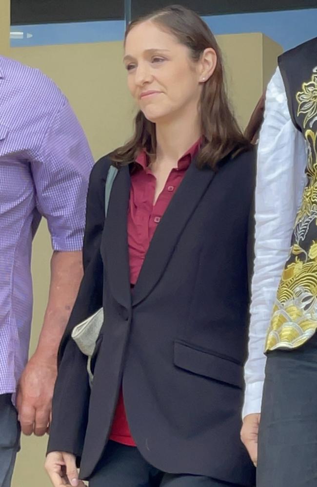 Jessica Blinda Polsoni (centre) Hanbury leaves Mackay courthouse after the murder charge against her was committed to the supreme court.